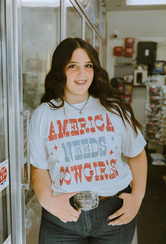 America Needs Cowgirls Tee