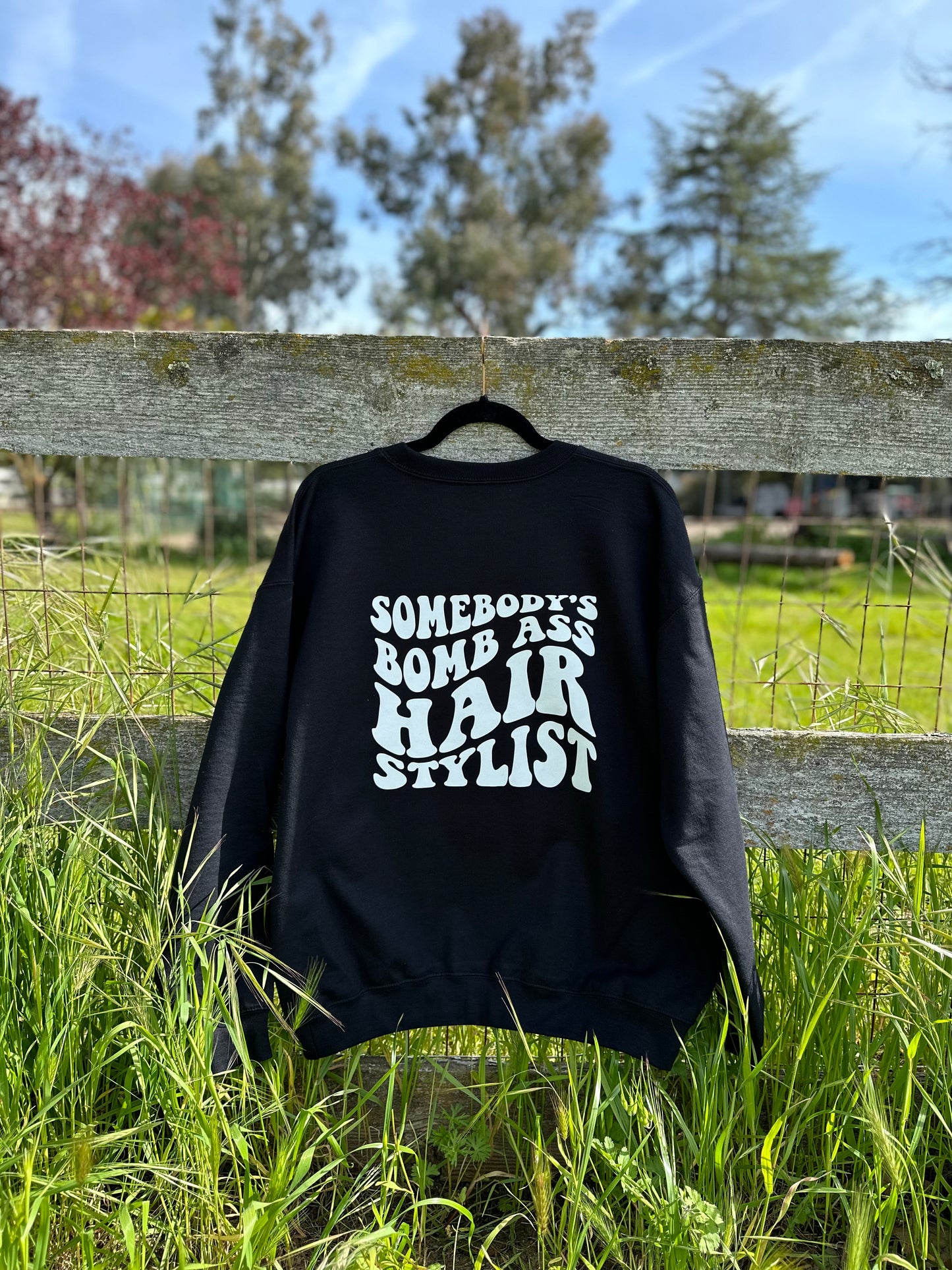 Somebody's Bomb Hairstylist Crewneck